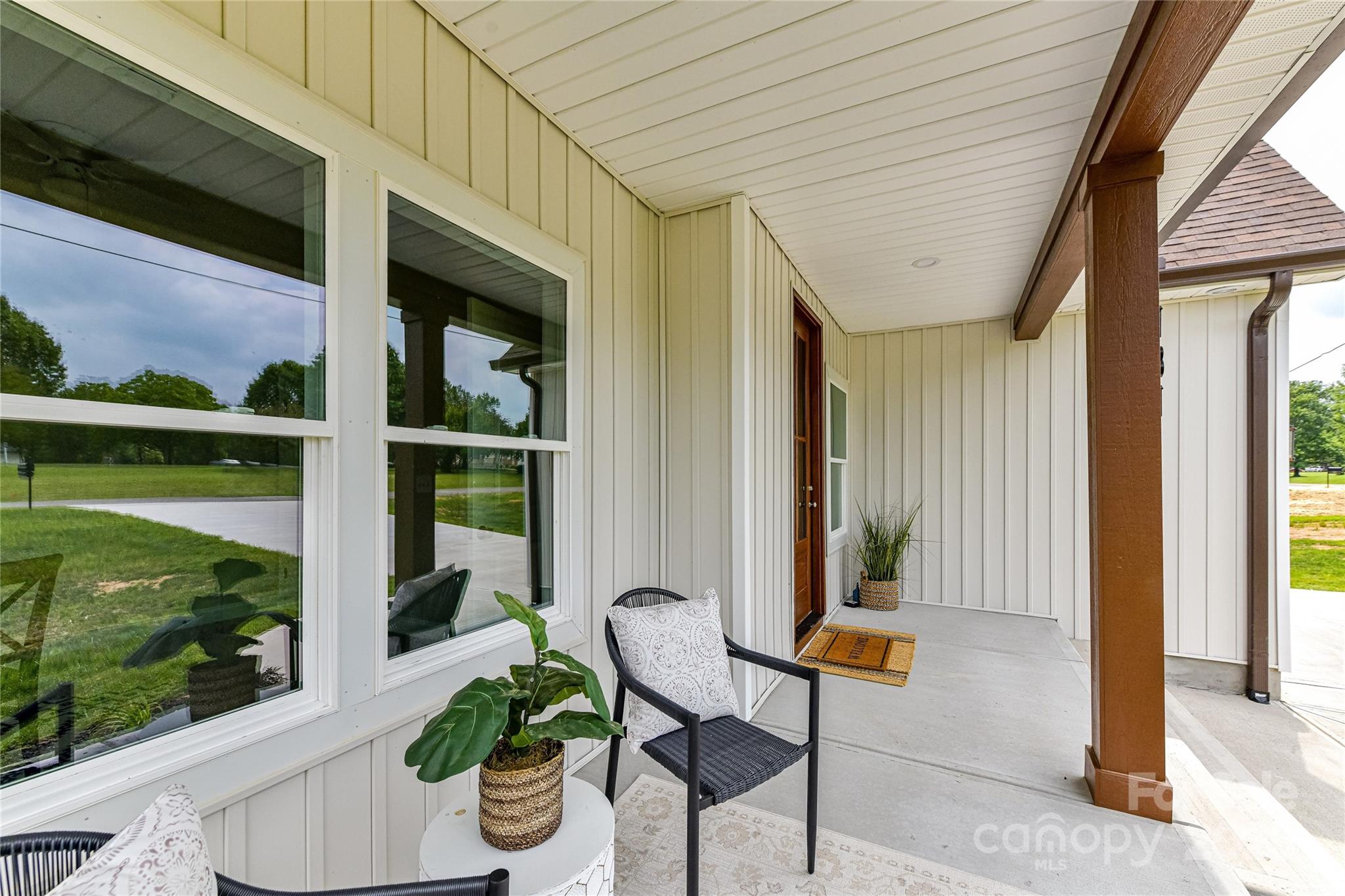 181 Lone Pine Road Statesville, NC 28625 - Photo 5 of 42 a view of an outdoor dining space with a table and chairs