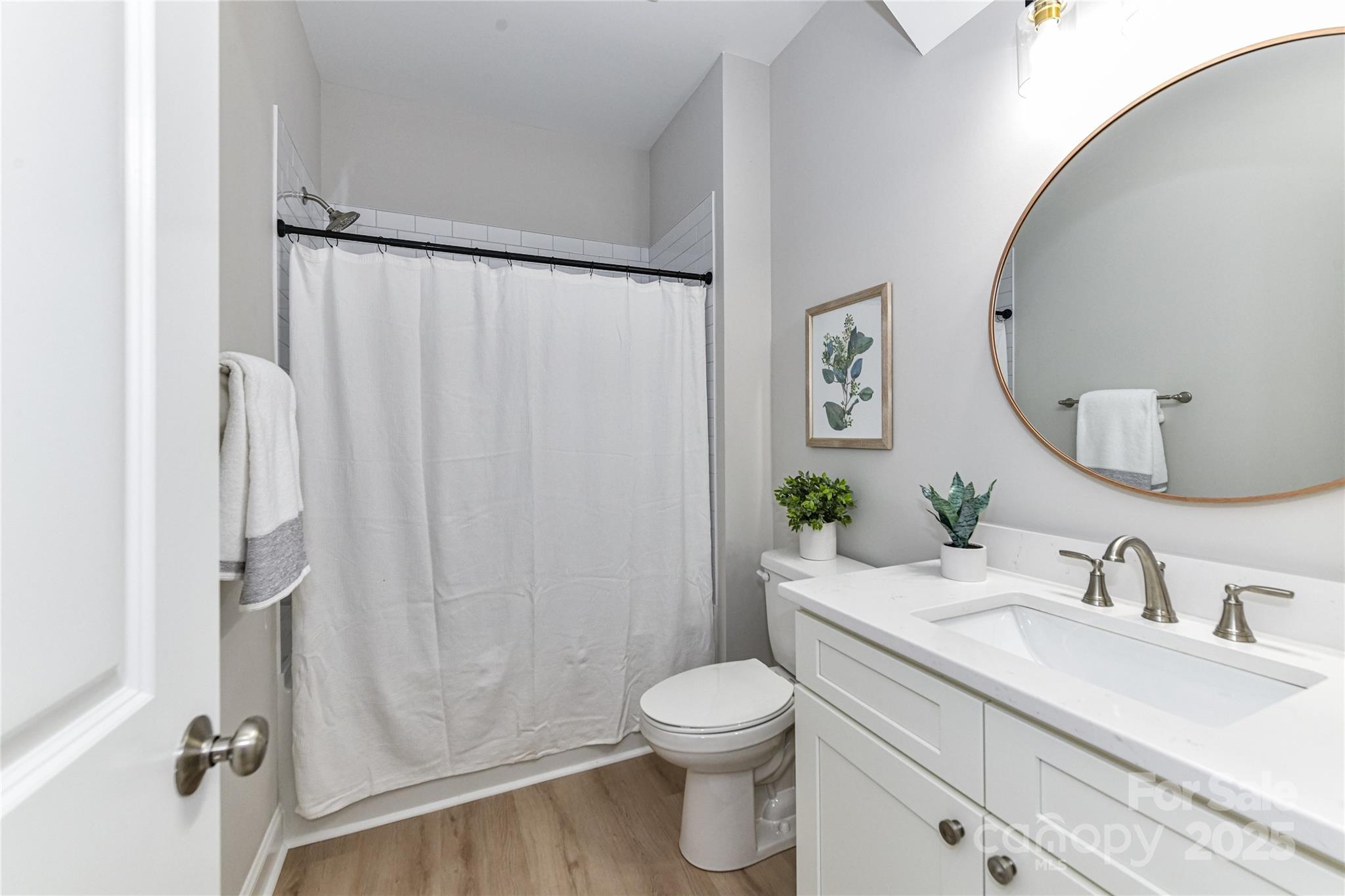 181 Lone Pine Road Statesville, NC 28625 - Photo 8 of 42 a bathroom with a granite countertop sink toilet and shower