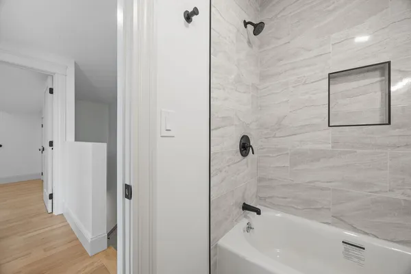 a bathroom with a bathtub