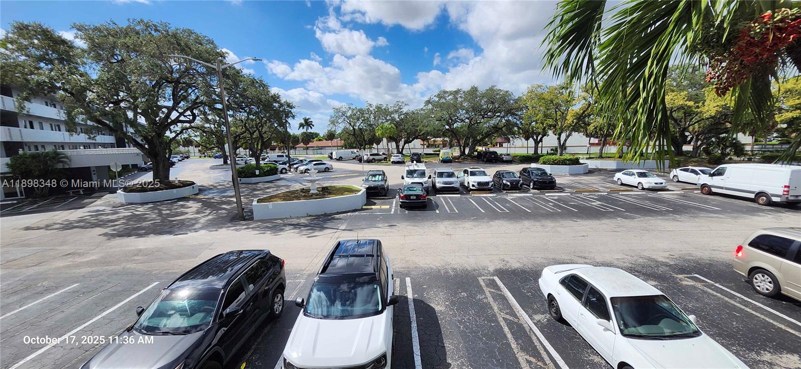 443 Northeast 195th Street, Unit 238 Miami, FL 33179 - Photo 15 of 15 a view of a patio with couches and a fire pit