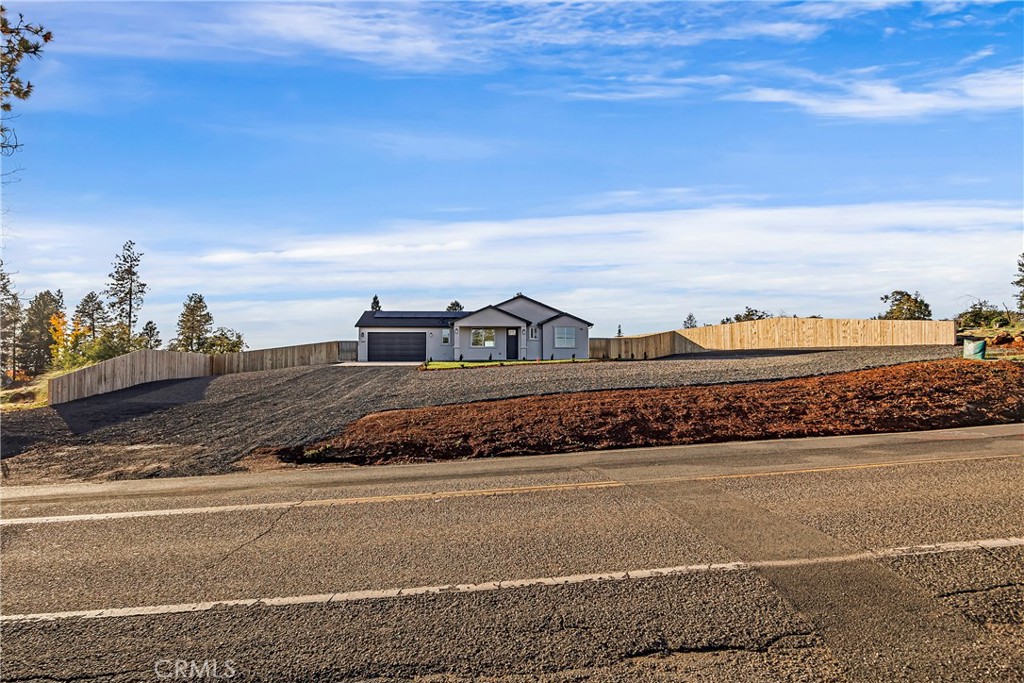 5369 Pentz Road Paradise, CA 95969 - Photo 2 of 42 a view of a city street with a building