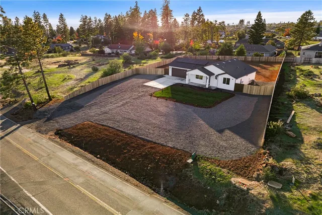 a view of a swimming pool with a yard