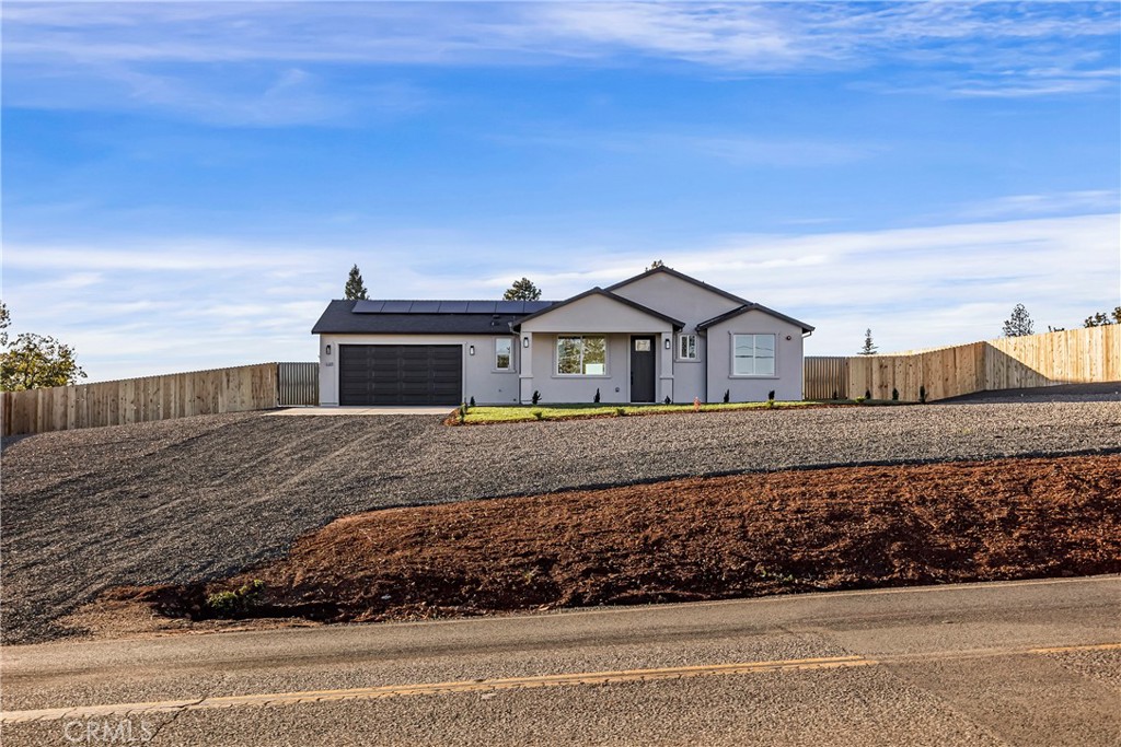 5369 Pentz Road Paradise, CA 95969 - Photo 9 of 42 a front view of a house with a garage