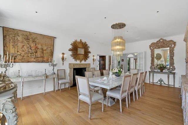 a bedroom with a bed couch and window