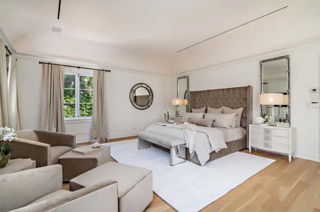 a bathroom with a sink double vanity and a mirror