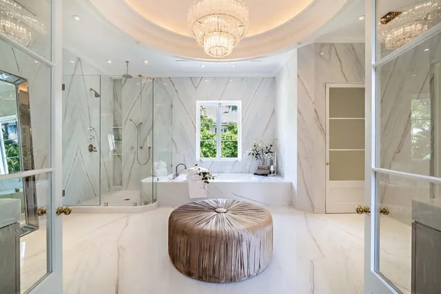 a white toilet sitting next to a window