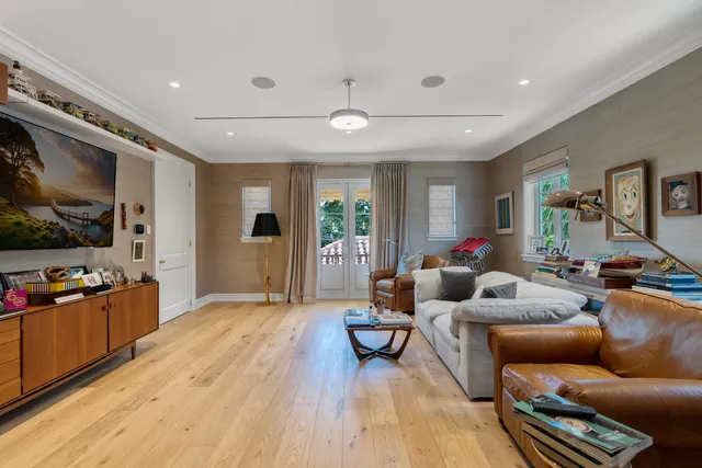 a living room with furniture and window