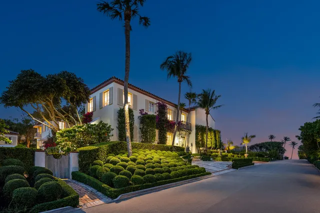 a view of a house with a street