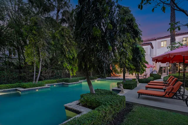 a garden view with a sitting space