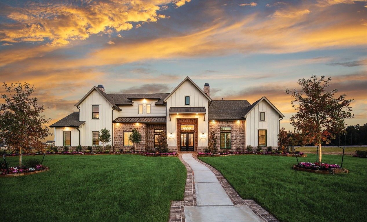 15925 Ridge Oak Road Willis, TX 77378 - Photo 22 of 22 a front view of a house with a yard