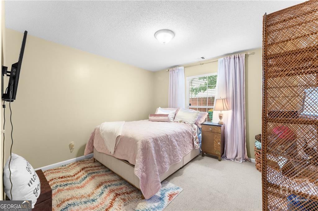 10 Fox Hound Court Pooler, GA 31322 - Photo 20 of 32 a bedroom with a bed and a window