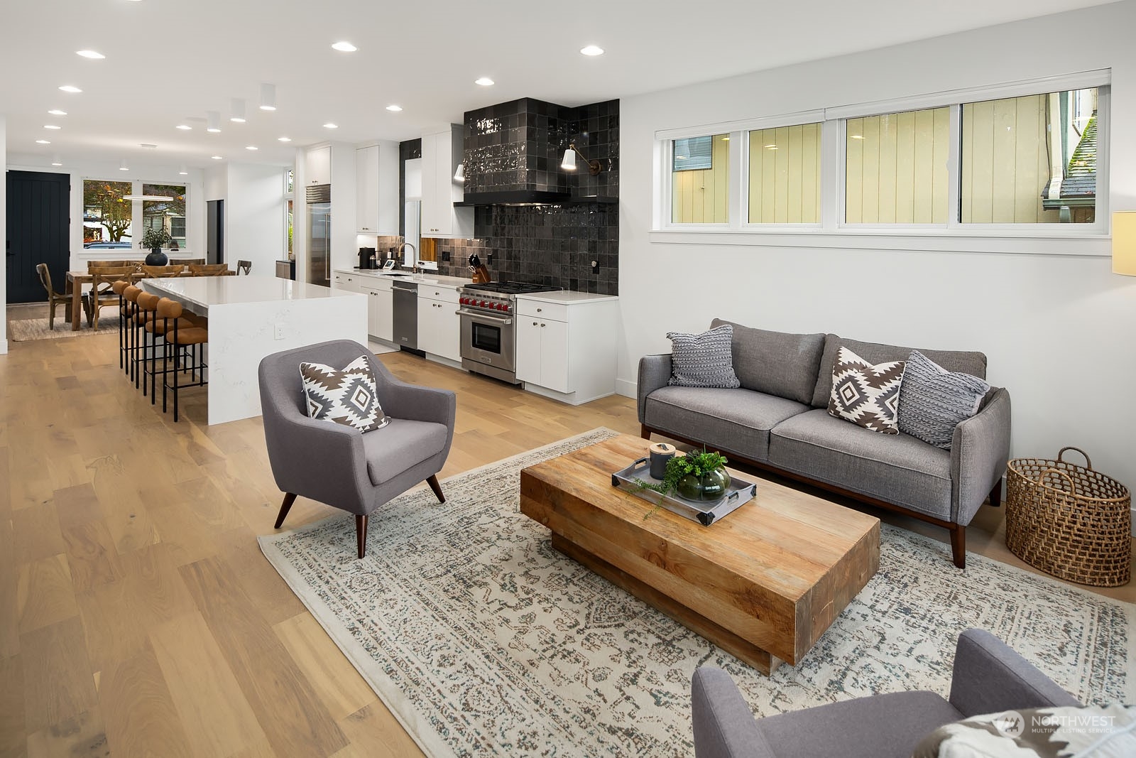 910 North 31st Street Renton, WA 98056 - Photo 15 of 32 a living room with furniture and kitchen view