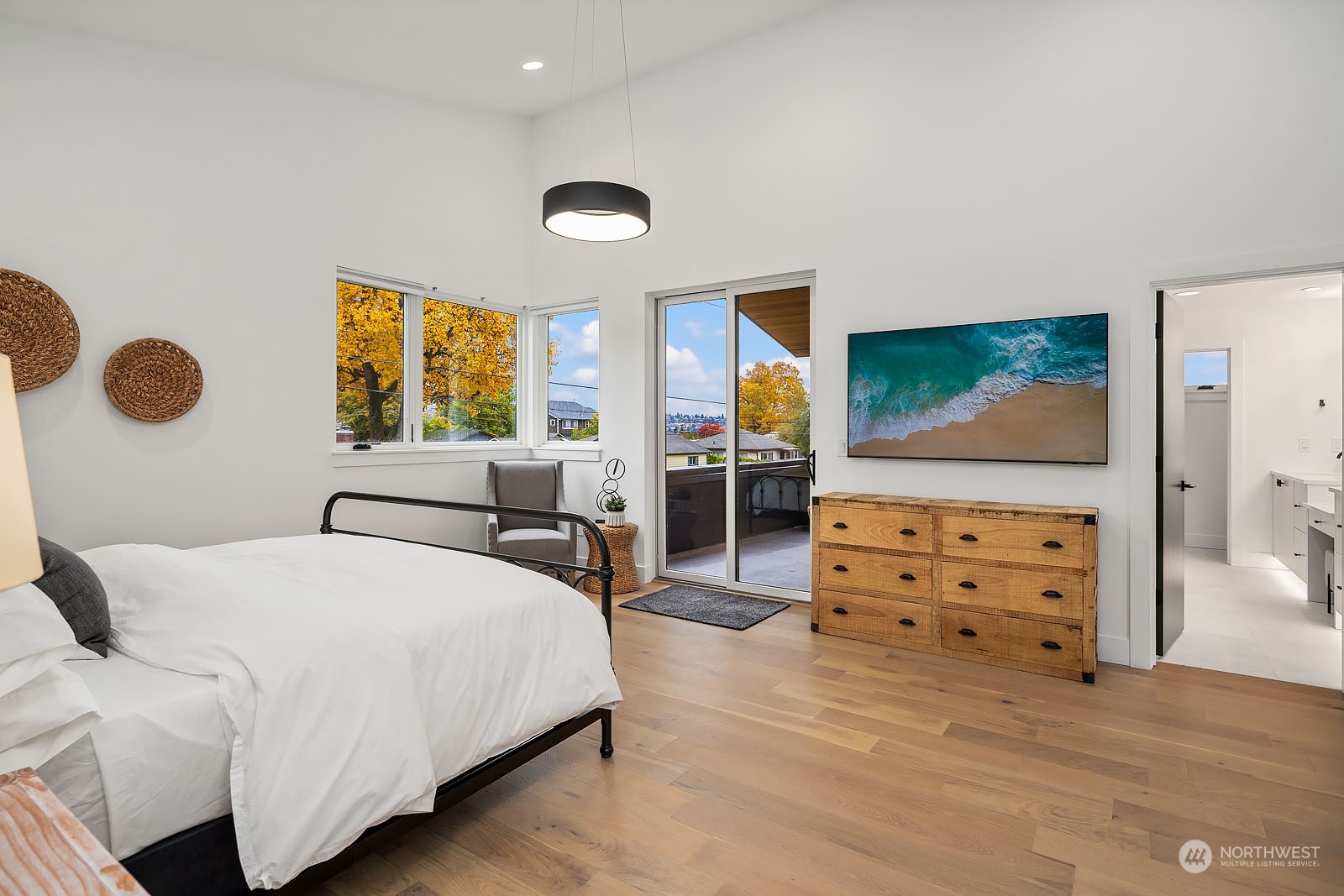 910 North 31st Street Renton, WA 98056 - Photo 19 of 32 a living room with furniture and a flat screen tv