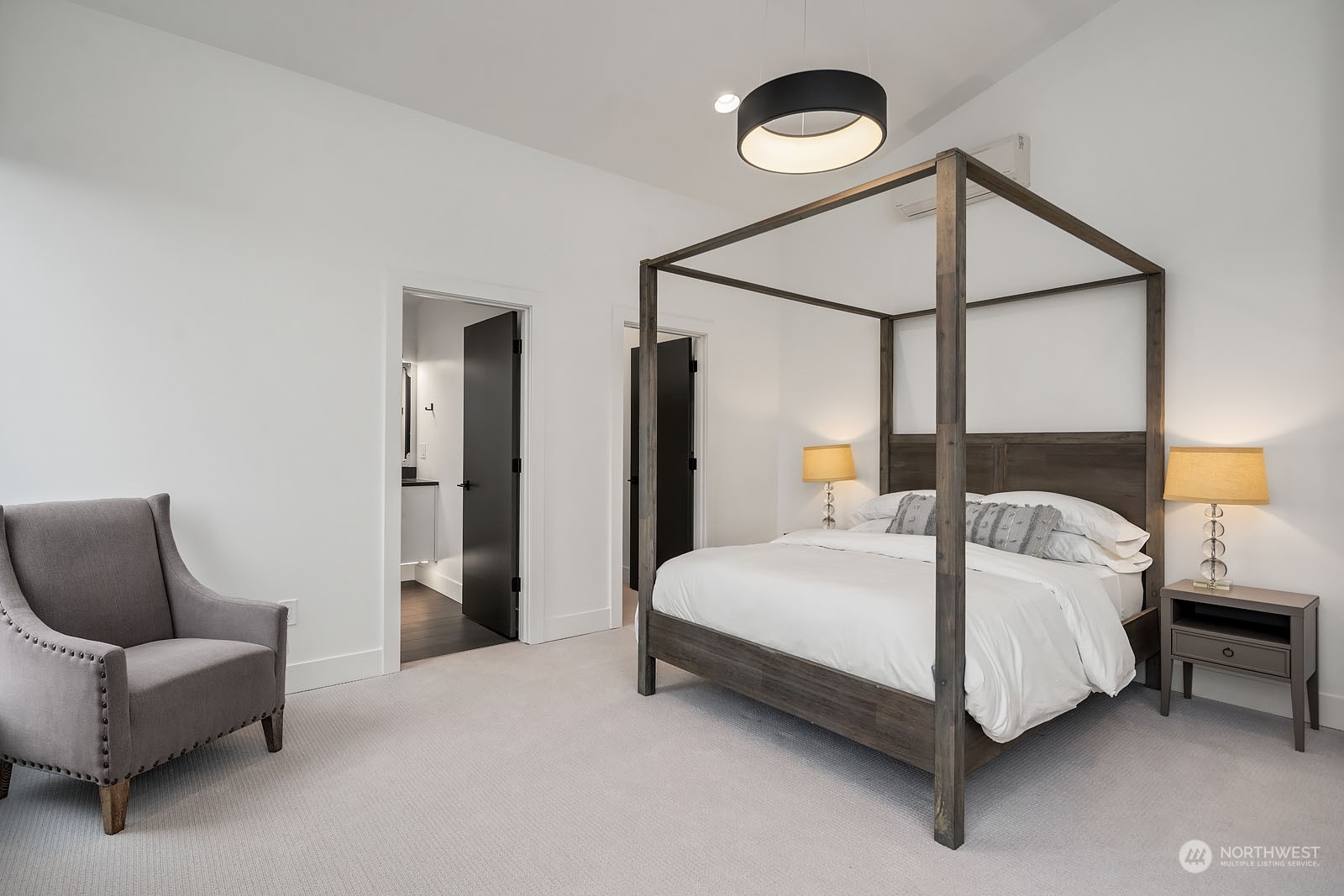 910 North 31st Street Renton, WA 98056 - Photo 25 of 32 a bedroom with a bed couch and a closet