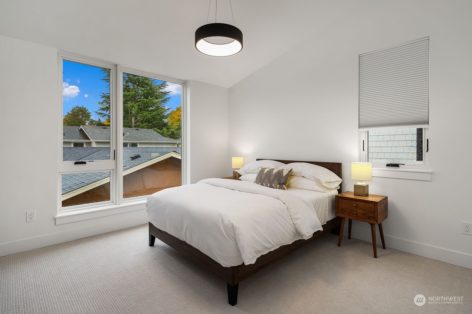 910 North 31st Street Renton, WA 98056 - Photo 27 of 32 a bedroom with a bed and a window