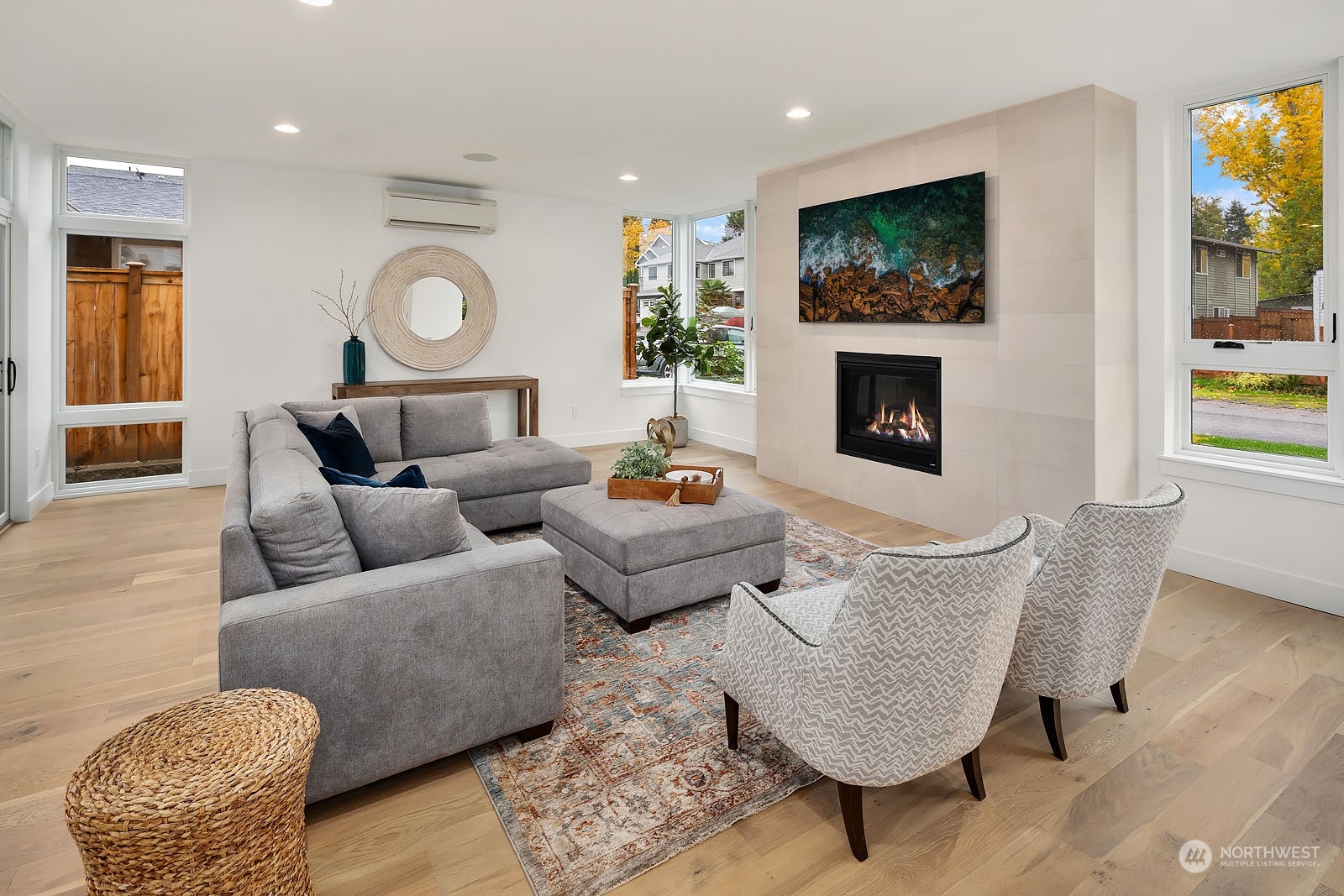 910 North 31st Street Renton, WA 98056 - Photo 5 of 32 a living room with furniture and a fireplace