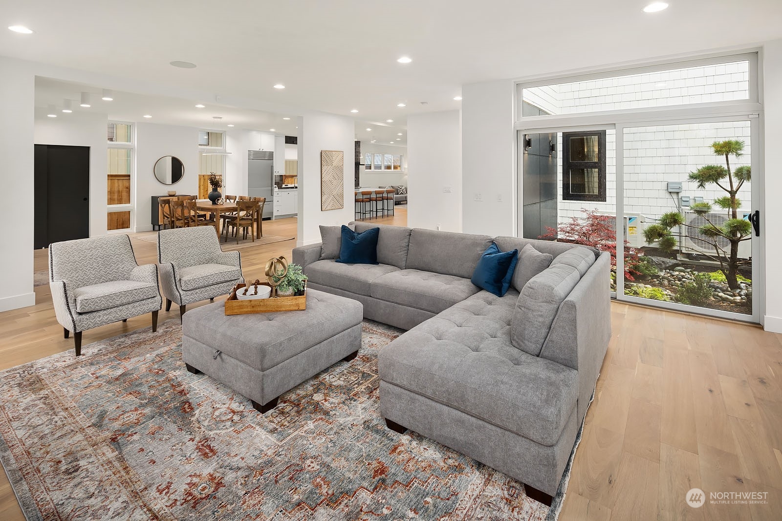 910 North 31st Street Renton, WA 98056 - Photo 7 of 32 a living room with furniture and a potted plant