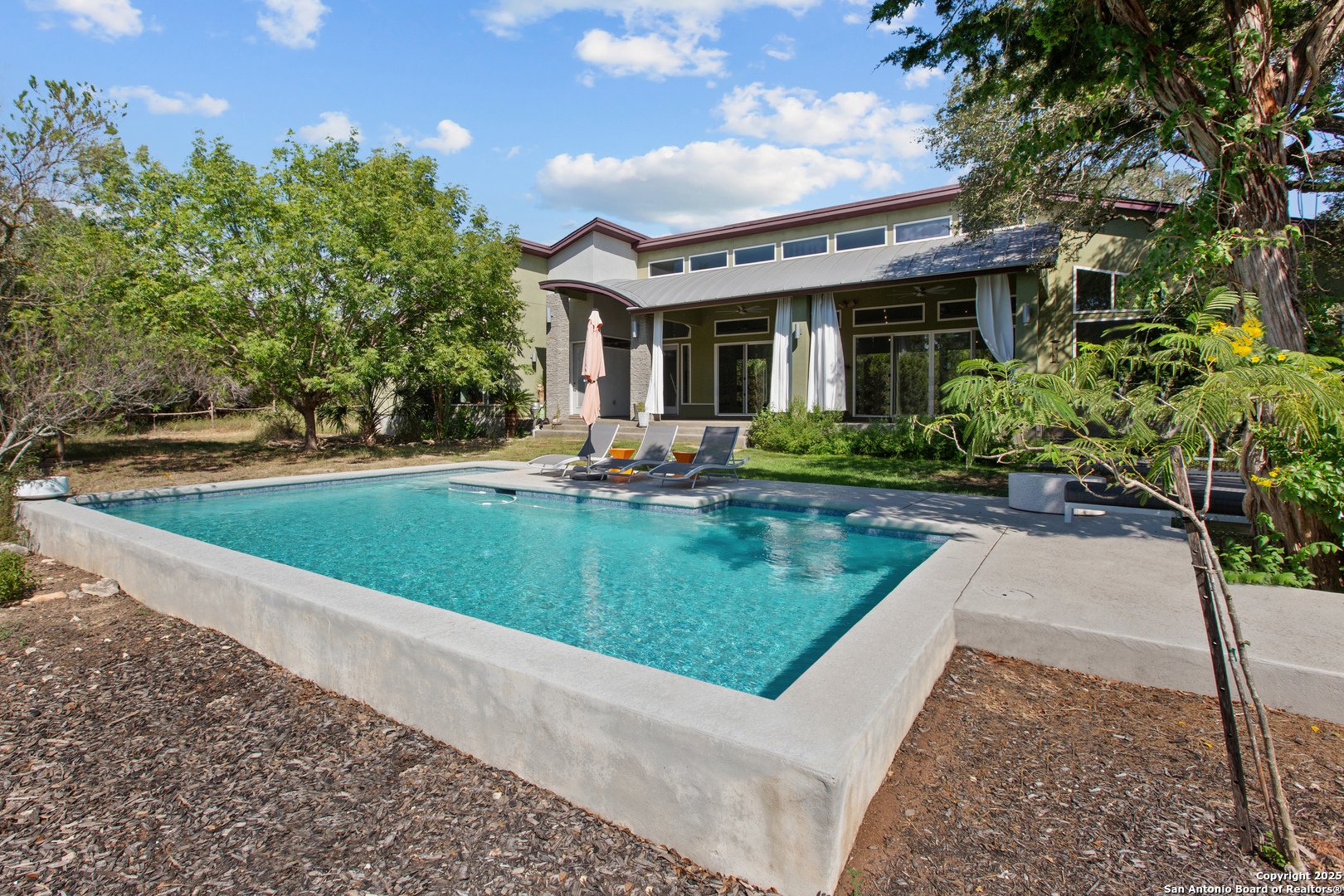 1280 Stoney Ridge Road Bulverde, TX 78163 - Photo 1 of 25 front view of a house with a yard
