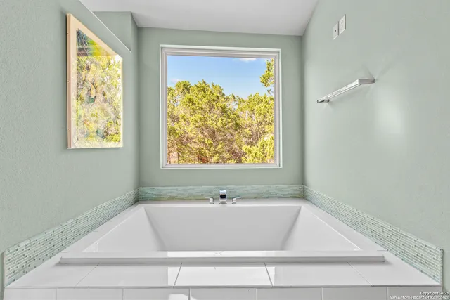 a bathroom with a bathtub