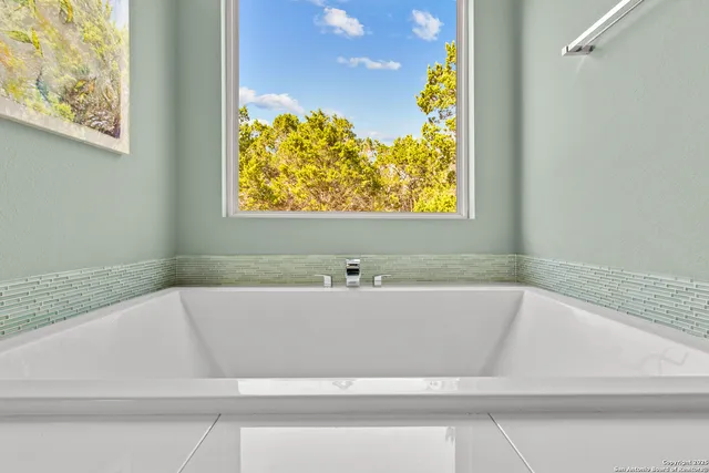 a view of a kitchen from the hallway