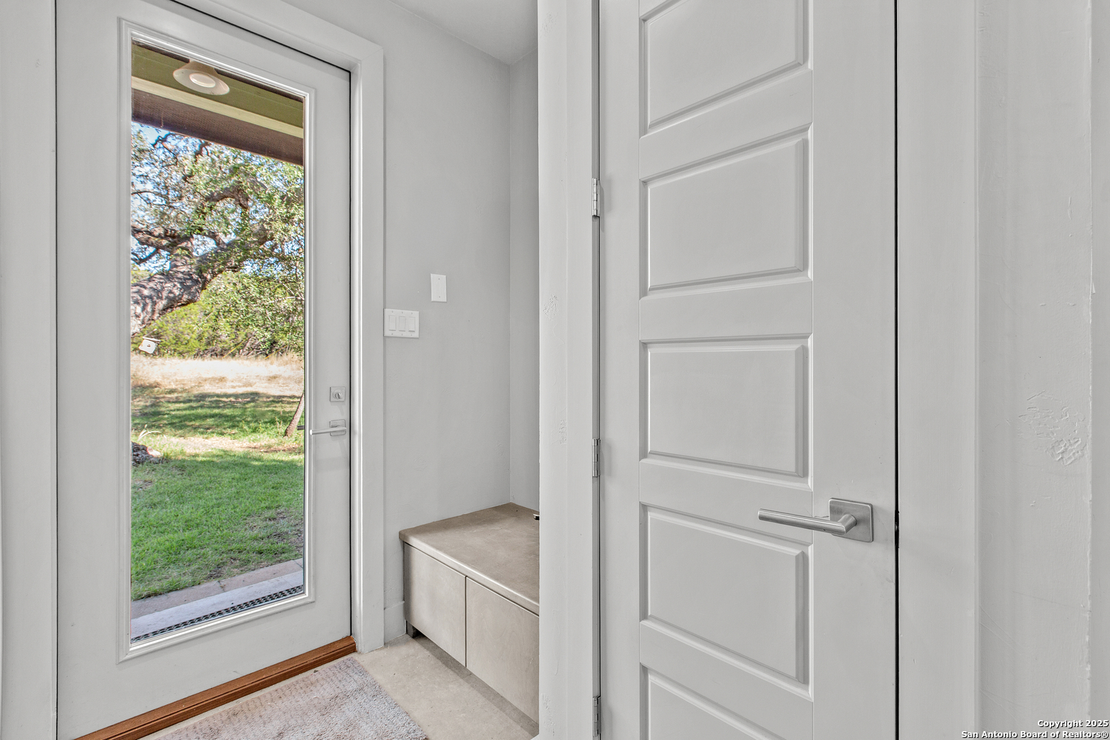 1280 Stoney Ridge Road Bulverde, TX 78163 - Photo 14 of 25 a view of a kitchen from the hallway