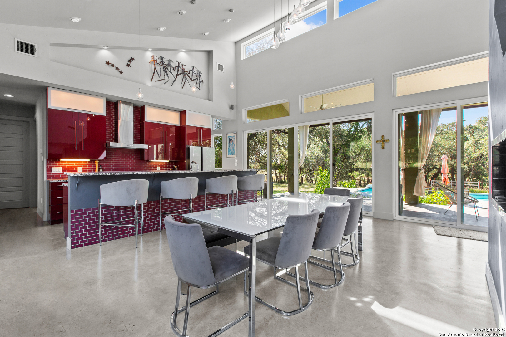 1280 Stoney Ridge Road Bulverde, TX 78163 - Photo 16 of 25 a view of a dining room with furniture window and outside view