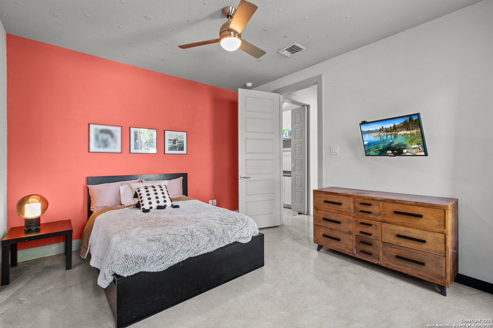1280 Stoney Ridge Road Bulverde, TX 78163 - Photo 22 of 43 a bedroom with a bed and a dresser