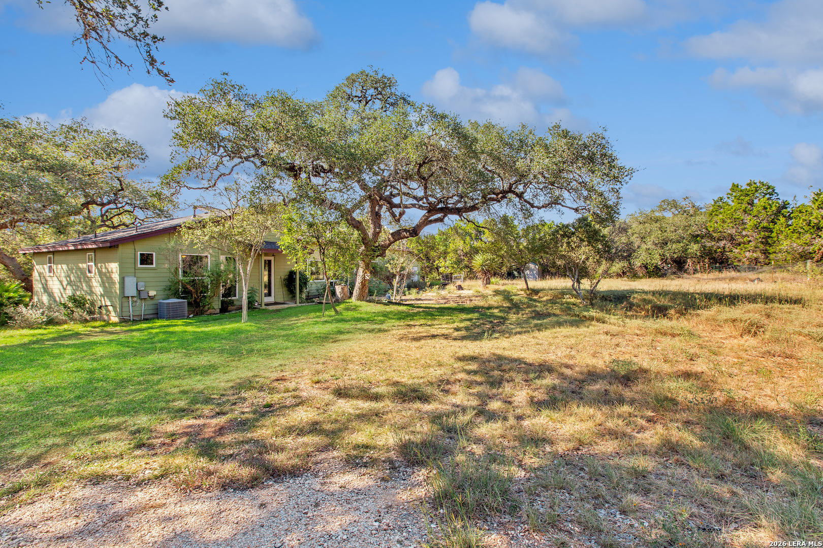 1280 Stoney Ridge Road Bulverde, TX 78163 - Photo 23 of 43 a view of outdoor space with garden and trees