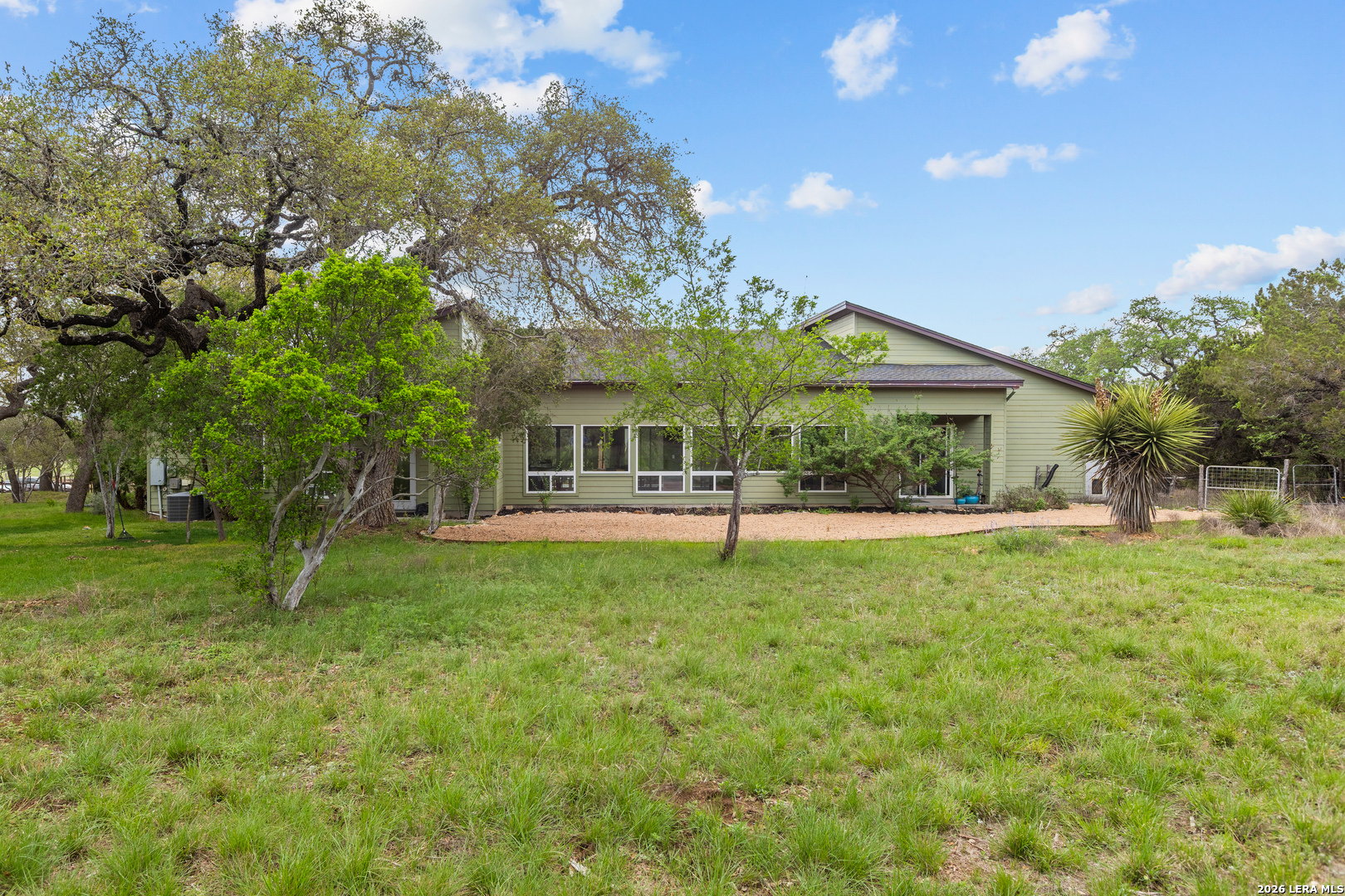 1280 Stoney Ridge Road Bulverde, TX 78163 - Photo 30 of 43 a front view of a house with garden