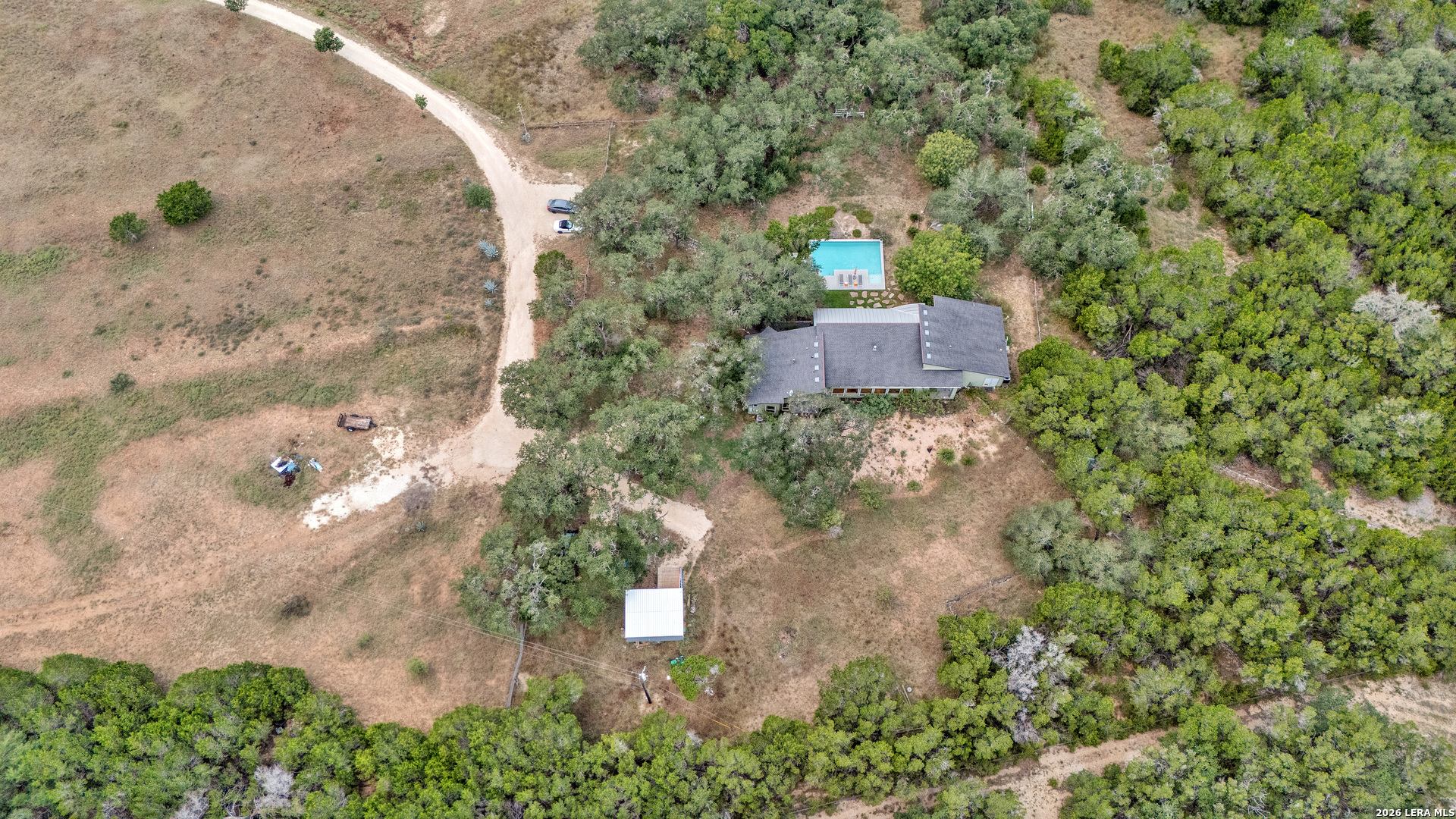1280 Stoney Ridge Road Bulverde, TX 78163 - Photo 36 of 43 an aerial view of a house with a yard