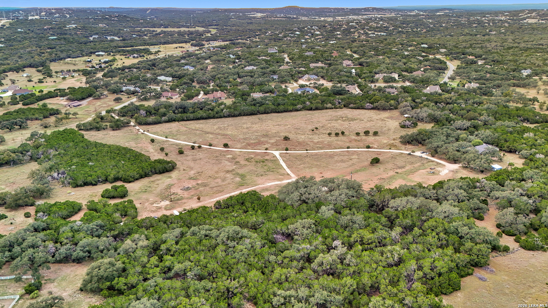 1280 Stoney Ridge Road Bulverde, TX 78163 - Photo 41 of 43 an aerial view of residential houses with outdoor space