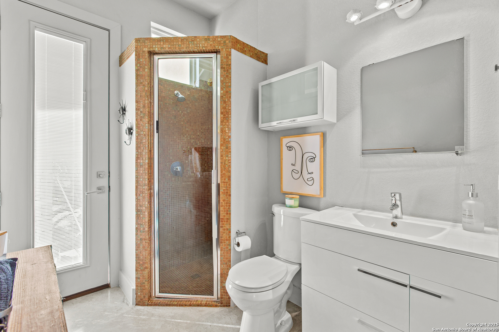 1280 Stoney Ridge Road Bulverde, TX 78163 - Photo 7 of 43 a bathroom with a sink toilet and shower