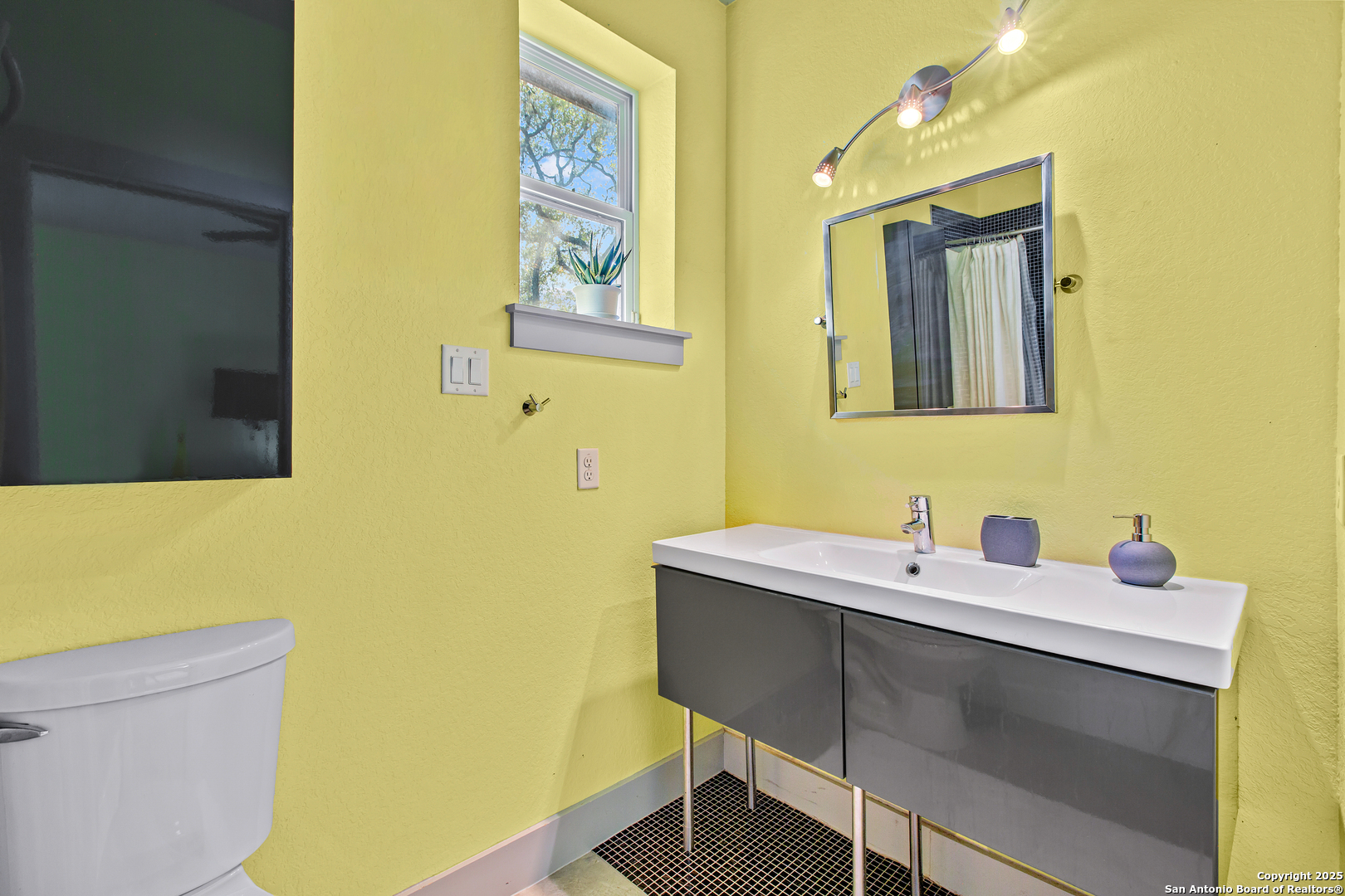 1280 Stoney Ridge Road Bulverde, TX 78163 - Photo 10 of 25 a bathroom with a sink and a mirror