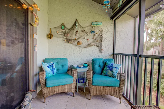 a couch sitting in front of a window