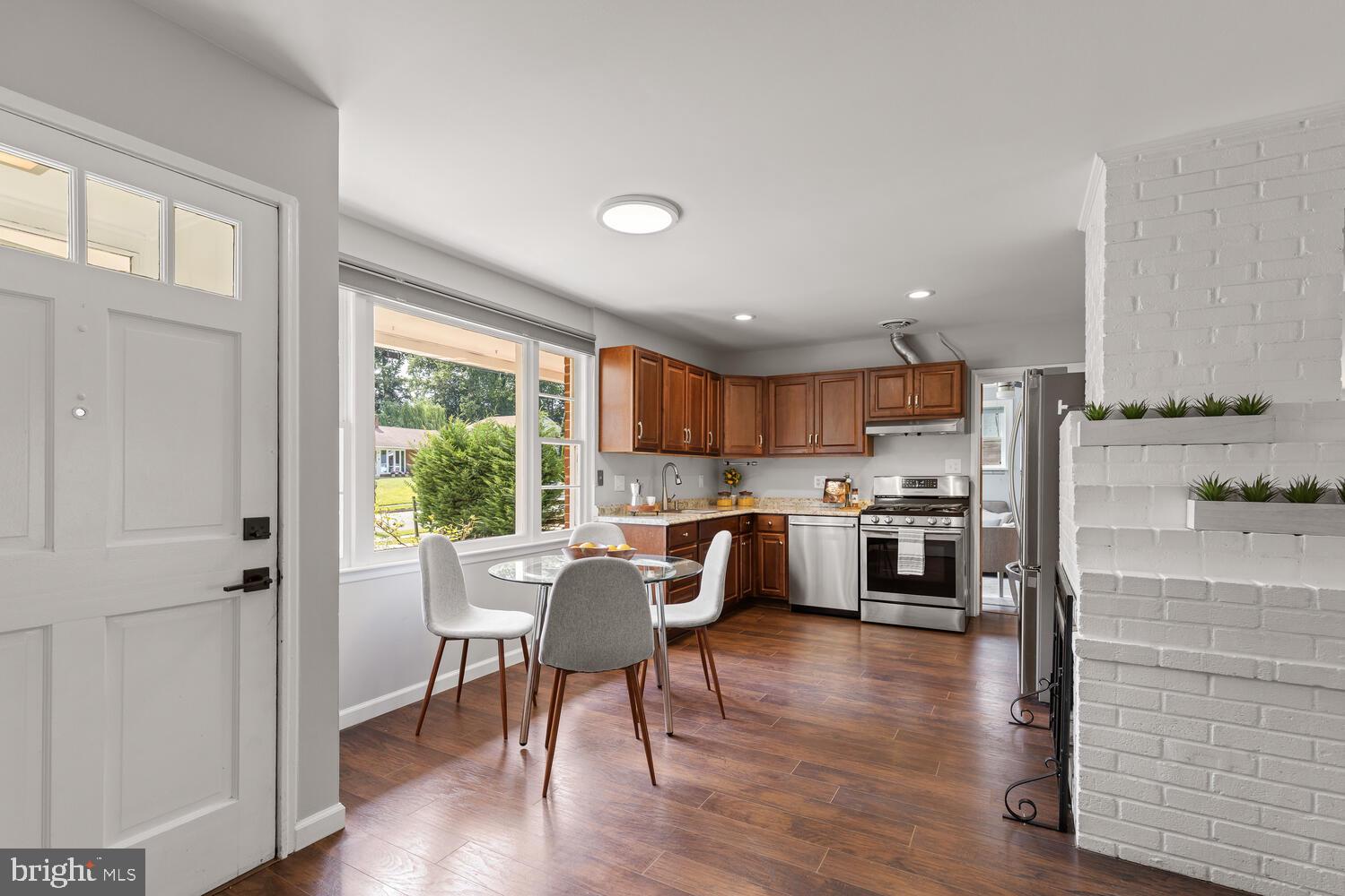 5333 Ravensworth Road Springfield, VA 22151 - Photo 11 of 38 Sunny eat-in kitchen w stainless steel appliances!