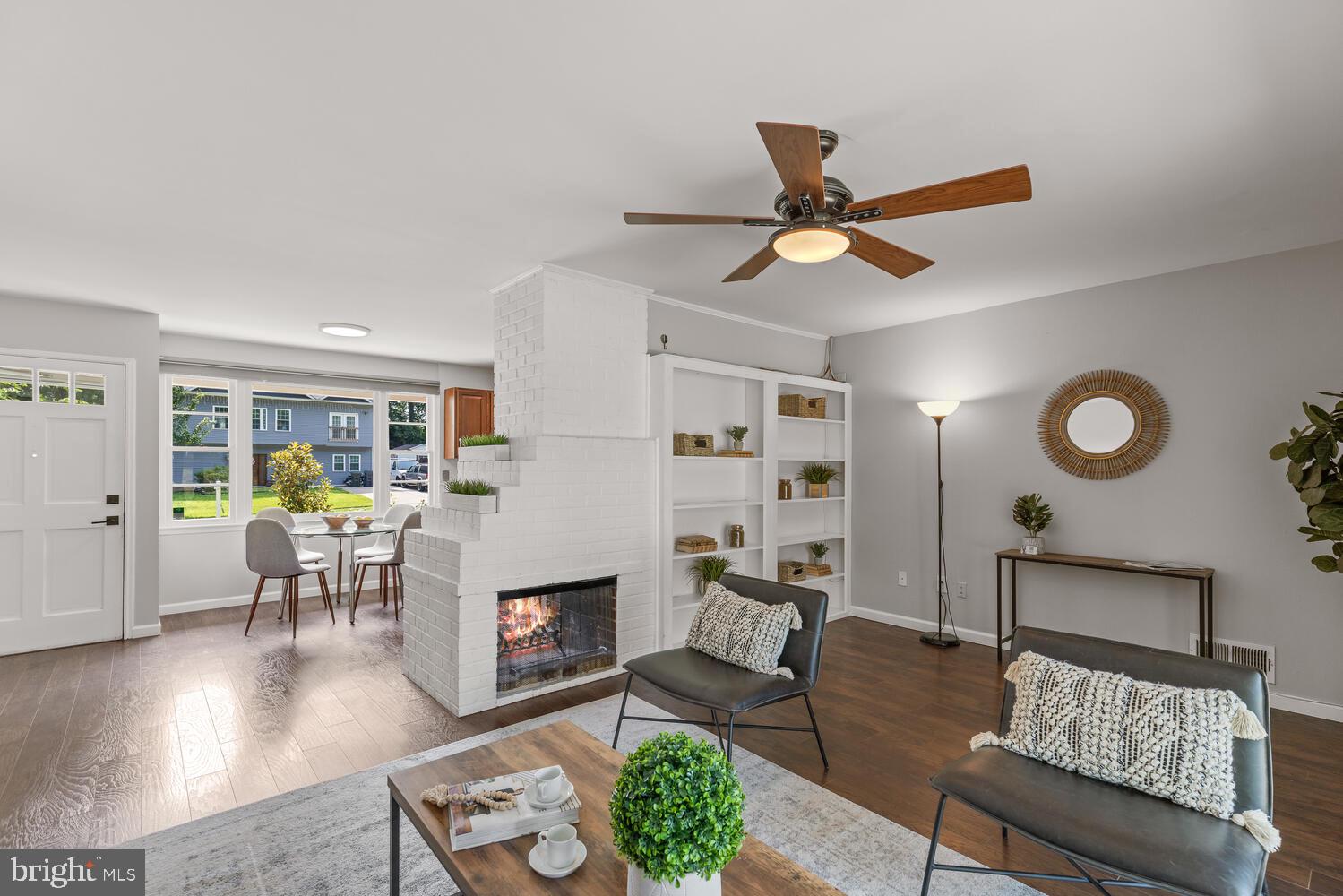5333 Ravensworth Road Springfield, VA 22151 - Photo 18 of 38 Living room w fireplace + sliding doors to yard
