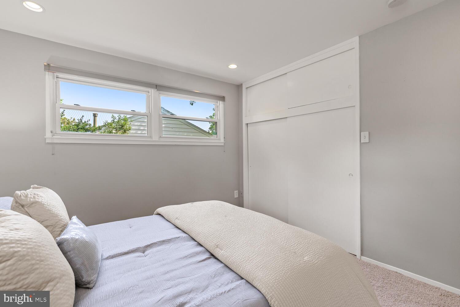 5333 Ravensworth Road Springfield, VA 22151 - Photo 26 of 38 Light and Bright Primary Bedroom with carpet