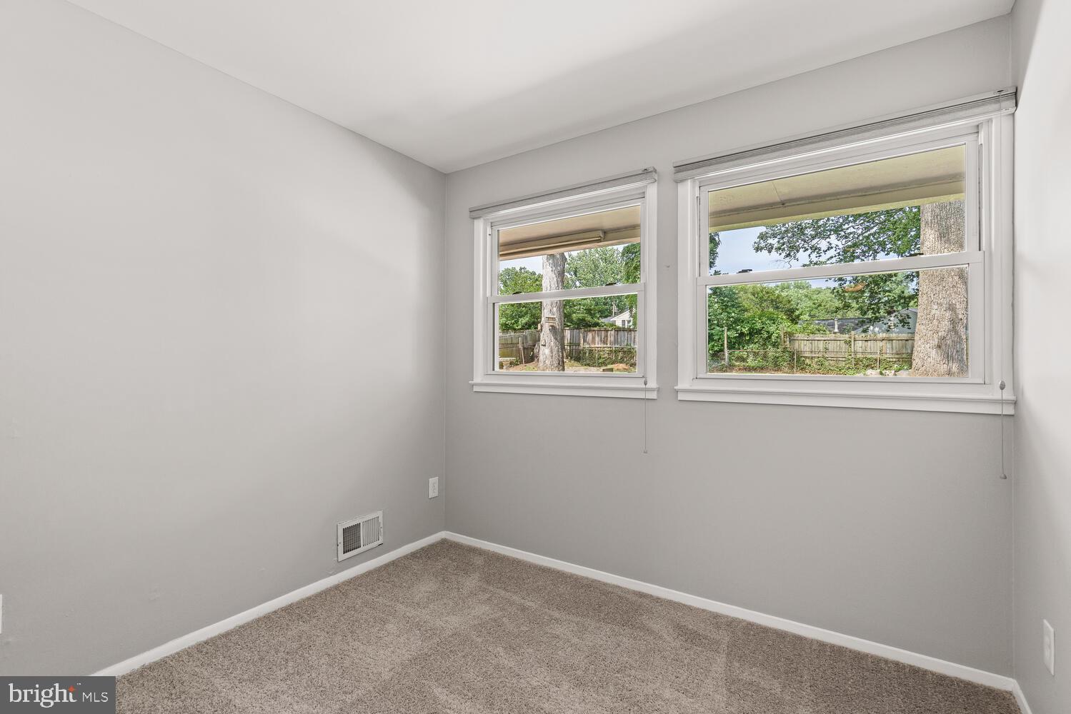 5333 Ravensworth Road Springfield, VA 22151 - Photo 27 of 38 Sunny Bedroom 2 with carpet