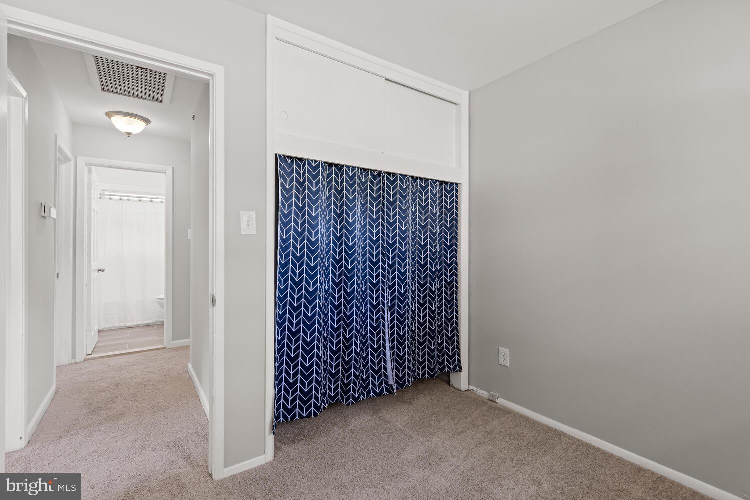 5333 Ravensworth Road Springfield, VA 22151 - Photo 28 of 38 Sunny Bedroom 2 with carpet