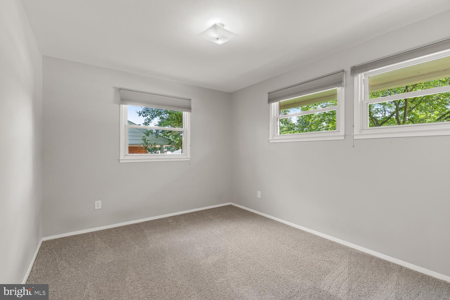 5333 Ravensworth Road Springfield, VA 22151 - Photo 29 of 38 Light-filled Bedroom 3 with Carpet