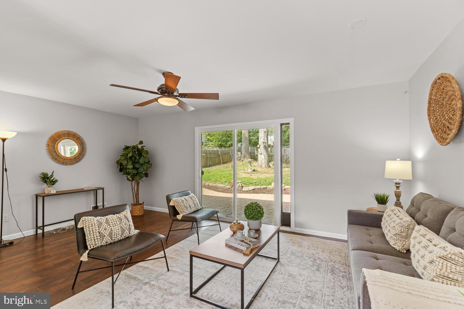 5333 Ravensworth Road Springfield, VA 22151 - Photo 4 of 38 Living room w fireplace + sliding doors to yard