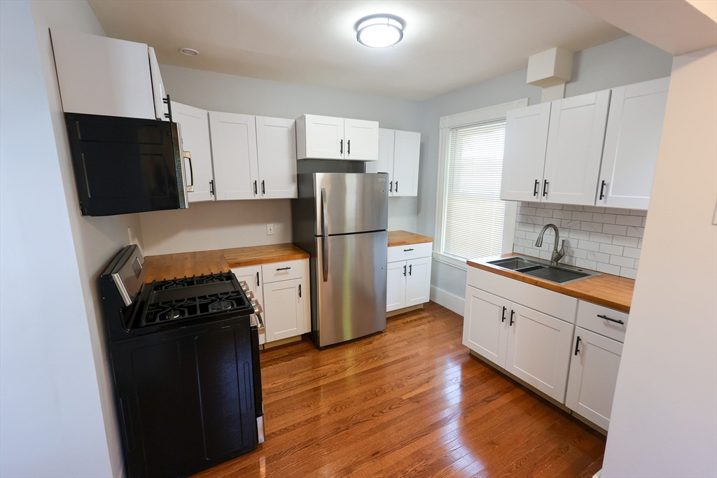 50 Thatcher Street, Unit 2 Boston, MA 02136 - Photo 2 of 22