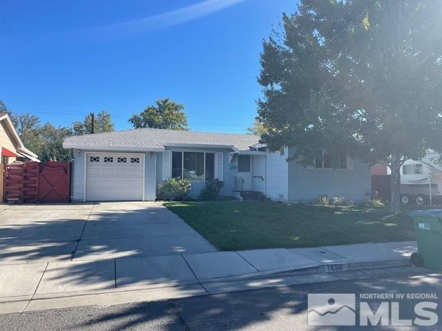 1650 Auburn Way Reno, NV 89502 - Photo 1 of 21 a view of a house with a yard