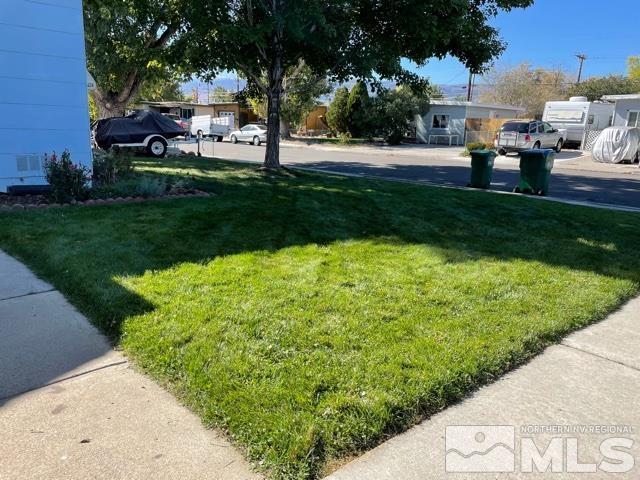 1650 Auburn Way Reno, NV 89502 - Photo 16 of 21 a view of yard with swimming pool and green space