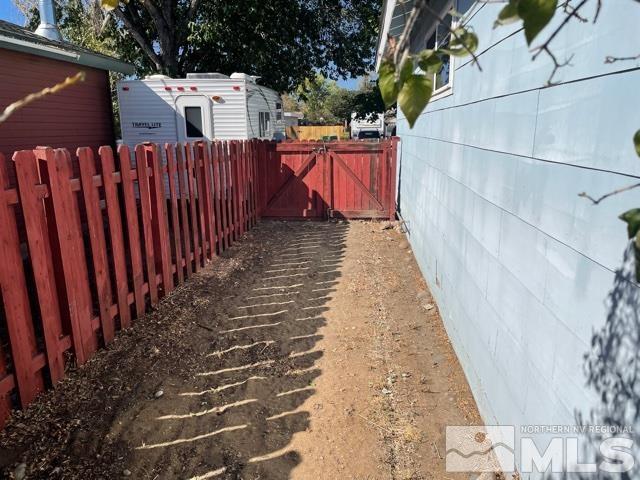 1650 Auburn Way Reno, NV 89502 - Photo 17 of 21 a view of small yard with wooden fence