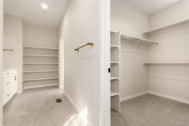 a view of an empty walk in closet