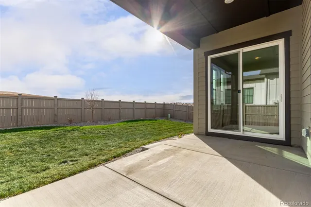 a view of a backyard with pathway