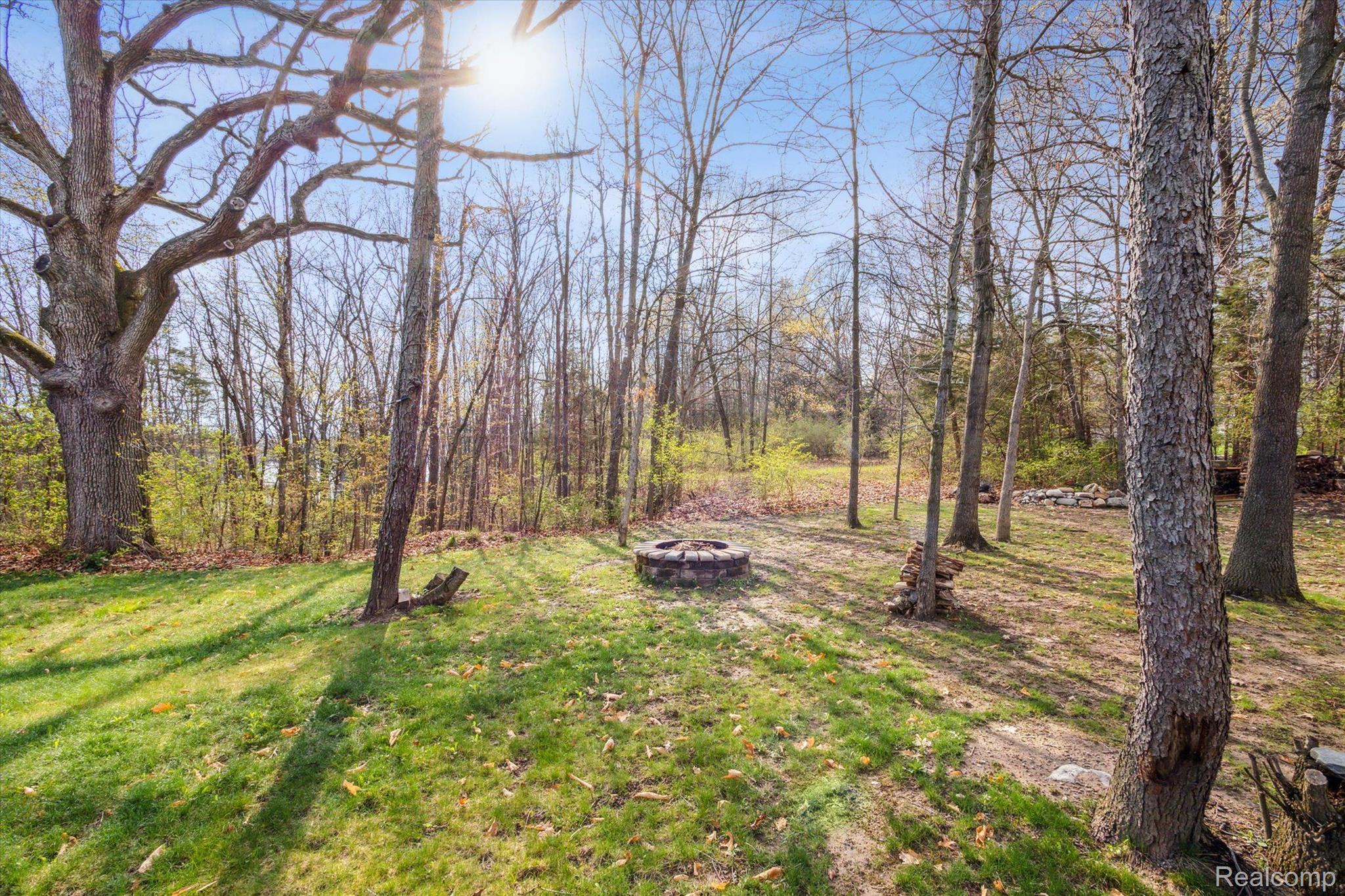 2659 West Coon Lake Road Howell, MI 48843 - Photo 38 of 45 Enjoy a bonfire