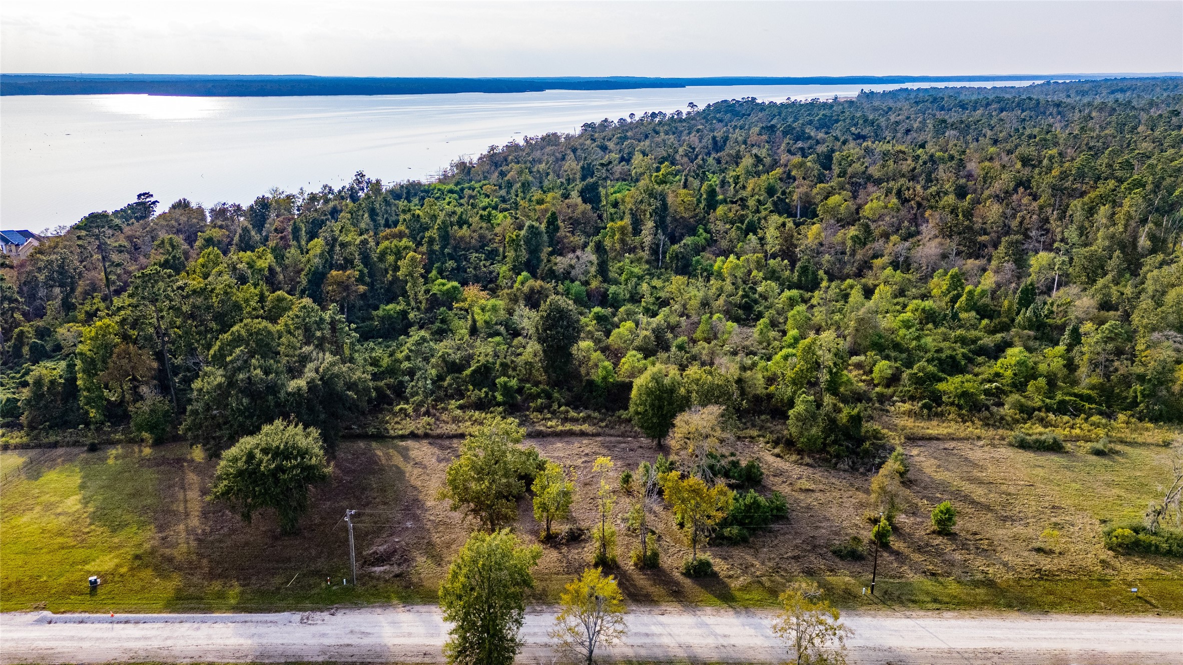 20 Falcon Point Onalaska, TX 77360 - Photo 2 of 7 a view of a lake with a mountain