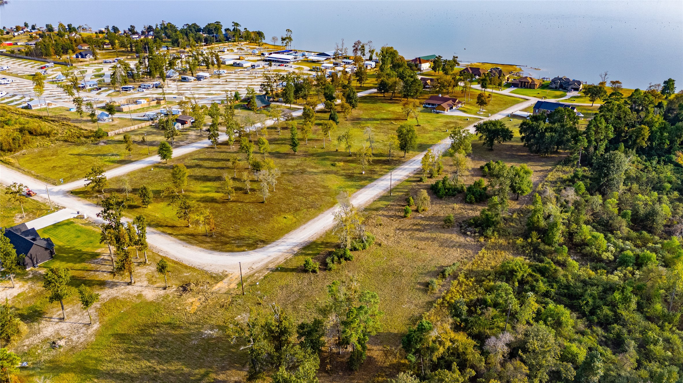 20 Falcon Point Onalaska, TX 77360 - Photo 4 of 7 an aerial view of residential houses with outdoor space